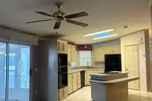 1202 Calusa Dr, Barefoot Bay, FL 32976 - Photo 6