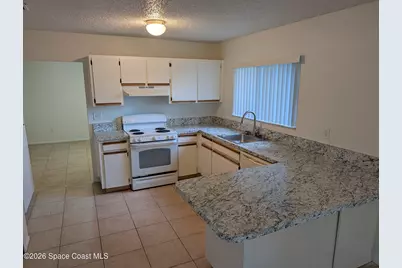 1257 NW Lamplighter Drive NW, Palm Bay, FL 32907 - Photo 2