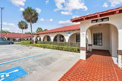 2040 Jimmy Buffett Memorial Highway #209 & 210, Indian Harbour Beach, FL 32937 - Photo 1