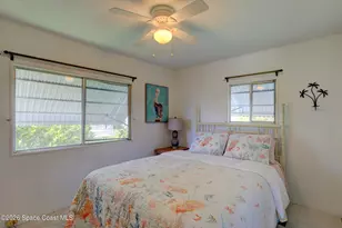 912 Oriole Cir, Barefoot Bay, FL 32976 - Photo 10