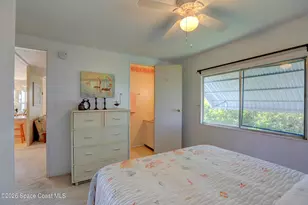 912 Oriole Cir, Barefoot Bay, FL 32976 - Photo 12