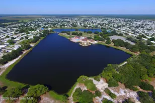 912 Oriole Cir, Barefoot Bay, FL 32976 - Photo 26