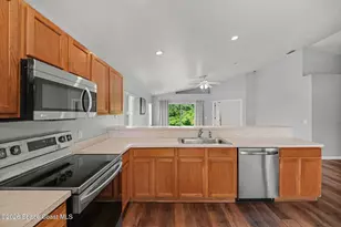 2476 Hidden Pine Ln NE, Palm Bay, FL 32905 - Photo 8