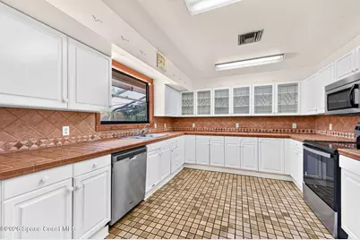 995 S Carpenter Road, Titusville, FL 32796 - Photo 16