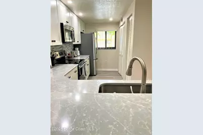 3160 N Atlantic Avenue #A103, Cocoa Beach, FL 32931 - Photo 6