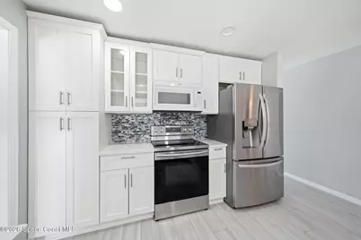 1172 Bay Drive E, Indian Harbour Beach, FL 32937 - Photo 18