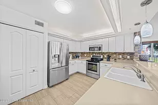 8935 Puerto Del Rio Dr, Cape Canaveral, FL 32920 - Photo 4