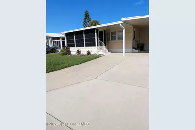 1009 Buttonwood Street, Barefoot Bay, FL 32976 - Photo 2