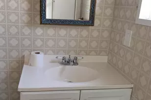 1009 Buttonwood St, Barefoot Bay, FL 32976 - Photo 18