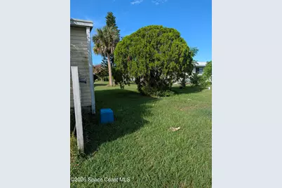 1009 Buttonwood Street, Barefoot Bay, FL 32976 - Photo 4