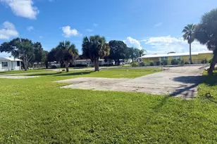 297 Egret Cir, Barefoot Bay, FL 32976 - Photo 1