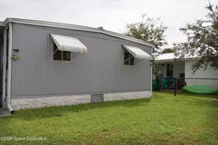 1023 Oriole Cir, Barefoot Bay, FL 32976 - Photo 18