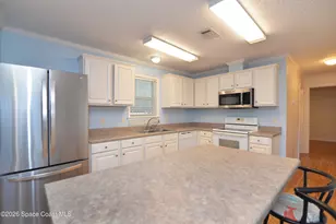840 Hyacinth Cir, Barefoot Bay, FL 32976 - Photo 6