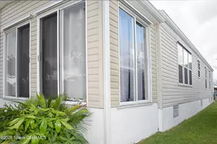 840 Hyacinth Cir, Barefoot Bay, FL 32976 - Photo 32