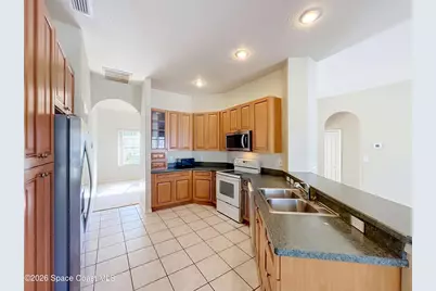 3677 Whisperwood Circle, Melbourne, FL 32901 - Photo 32