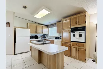 1967 Big Cypress Street NE, Palm Bay, FL 32905 - Photo 6