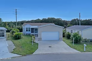 879 Laurel Cir, Barefoot Bay, FL 32976 - Photo 36