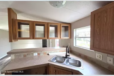 6987 Melaleuca Road, Cocoa, FL 32927 - Photo 10