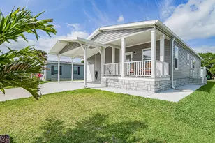 623 Hyacinth Cir, Barefoot Bay, FL 32976 - Photo 1