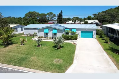 1047 Sebastian Road, Barefoot Bay, FL 32976 - Photo 1