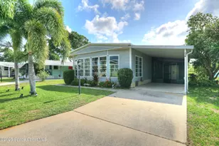 710 Hyacinth Cir, Barefoot Bay, FL 32976 - Photo 1
