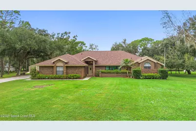 7548 Egret Drive, Titusville, FL 32780 - Photo 1