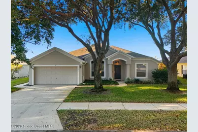 5596 River Oaks Drive N, Titusville, FL 32780 - Photo 1