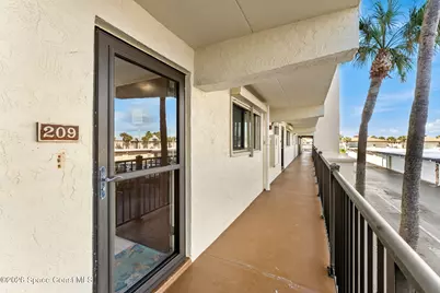 3060 N Atlantic Avenue #209, Cocoa Beach, FL 32931 - Photo 1