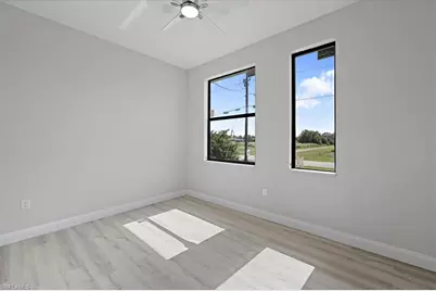 843 Theodore Vail St E, Lehigh Acres, FL 33974 - Photo 26