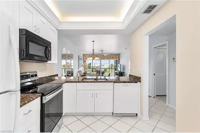 14891 Hole in One Cir #307 - MUIRFIELD, Fort Myers, FL 33919 - Photo 6