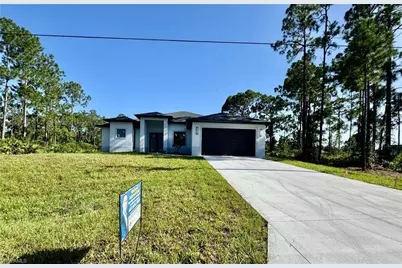542 Ames St E, Lehigh Acres, FL 33974 - Photo 1
