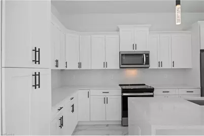 719 Fullerton Ave S, Lehigh Acres, FL 33974 - Photo 22