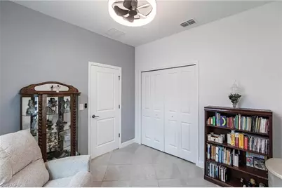 9128 Leatherwood Loop, Lehigh Acres, FL 33936 - Photo 30