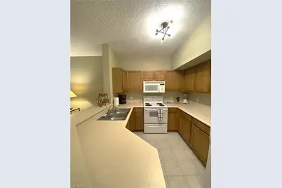 15585 Ocean Walk Cir #302, Fort Myers, FL 33908 - Photo 20