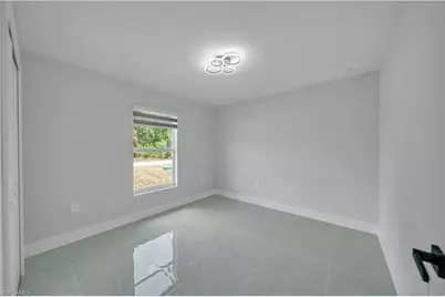2801 42nd St W, Lehigh Acres, FL 33971 - Photo 4
