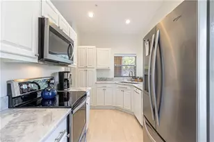 24814 Lakemont Cove Ln, Bonita Springs, FL 34134 - Photo 8