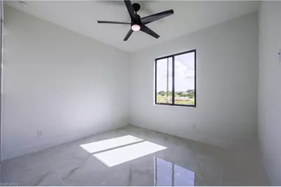 506 Morris Tyler Ave S, Lehigh Acres, FL 33974 - Photo 20