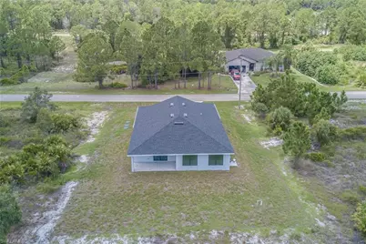 1037 Cheney Ave S, Lehigh Acres, FL 33974 - Photo 4