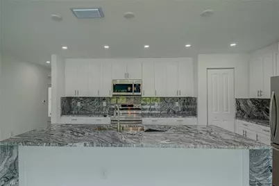 1037 Cheney Ave S, Lehigh Acres, FL 33974 - Photo 10