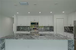 1037 Cheney Ave S, Lehigh Acres, FL 33974 - Photo 10