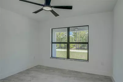 1037 Cheney Ave S, Lehigh Acres, FL 33974 - Photo 16