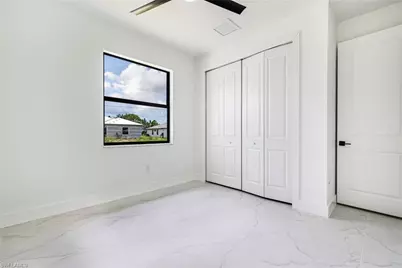 2406 Hightower Ave S, Lehigh Acres, FL 33973 - Photo 32