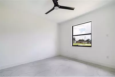 2406 Hightower Ave S, Lehigh Acres, FL 33973 - Photo 26