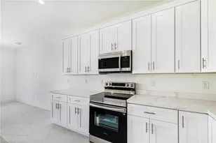 2406 Hightower Ave S, Lehigh Acres, FL 33973 - Photo 18