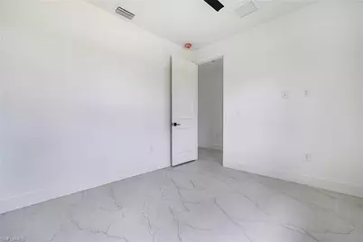 2406 Hightower Ave S, Lehigh Acres, FL 33973 - Photo 36