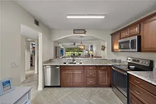 7025 Dennis Cir, Naples, FL 34104 - Photo 6