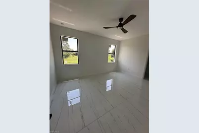 1049 Citrus Ave S, Lehigh Acres, FL 33974 - Photo 6