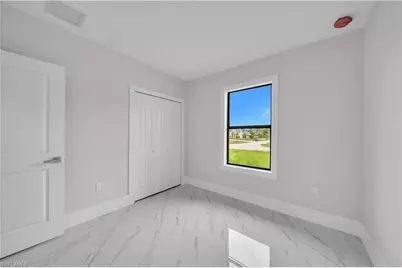 457 Woodman Dr, Lehigh Acres, FL 33972 - Photo 22