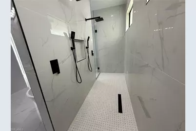 911 Asher St E, Lehigh Acres, FL 33974 - Photo 32