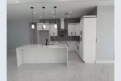 911 Asher St E, Lehigh Acres, FL 33974 - Photo 14